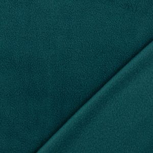 Nahaufnahme der Fleece petrolgrün Heavyweight Textur. Warmer, besonders dichter Stoff mit guter Isolation und weicher Oberfläche.