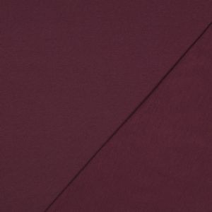 Plumfarbiger GOTS Sommersweat: rechts glatte Oberfläche, links die typische ungefasste French Terry Schlingenstruktur, nicht angeraut. 