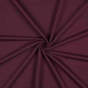 GOTS French Terry in Plum, Bio-Stoff, weich, bielastisch. Nahaufnahme der glatten, mittelschweren Baumwoll-Oberfläche. 