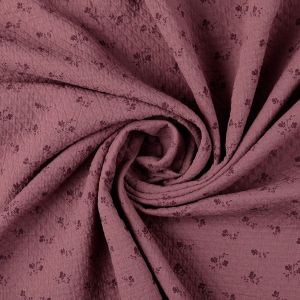 Musselin Jaquard Stoff in mauve mit ton-in-ton Blumendruck, 100% Baumwolle in hochwertiger Stepp-Optik für blickdichte Sommerbekleidung.