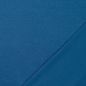 Nahaufnahme: Umgelegter Jersey-Stoff in Teal. Zeigt die glatte rechte Seite sowie die typische Struktur der R&uuml;ckseite des elastischen Single-Jersey-Stoffs.