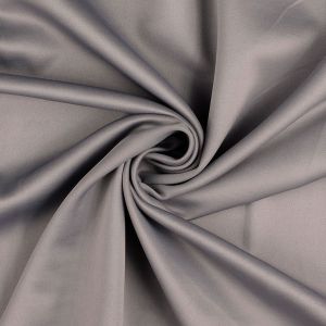 Hochwertiger Scuba Stoff in der Farbe grau mit weicher Oberfläche und dezentem Glanz. Ideal für Kleidung und kreative Projekte.