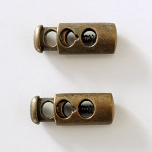 Rustikaler Kordelstopper aus Metall in altmessing für 3mm dicke Kordeln, 2 Stk. 