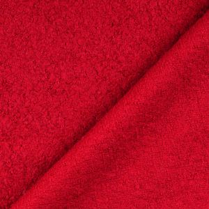 Woll-Bouclé Stoff in der Farbe erdbeerrot, mit Ansicht der strukturierten Vorderseite und der gleichfarbigen, glatteren Rückseite.