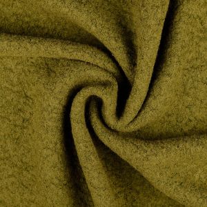 Nahaufnahme von einem schweren Woll-Bouclé Stoff in der Farbe olivgrün, mit der charakteristischen lockigen Oberfläche aus vielen kleinen Schlingen.